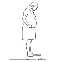 the pregnant woman is weighed on the scales