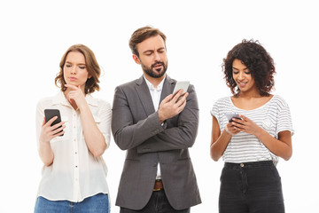 Group of pensive young multiethnic business people