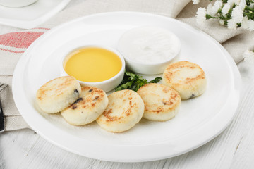 Syrniki. Pancakes with cheese.Traditional breakfast