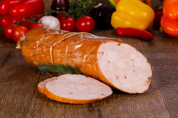 Pork sausages over wooden