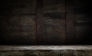 background of barrel and worn old table of wood