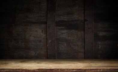 background of barrel and worn old table of wood