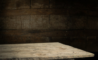 background of barrel and worn old table of wood