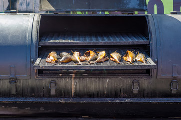 Smoking fish hot street good