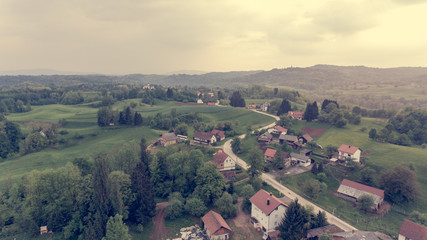 Aerial view of countryside at sunset.