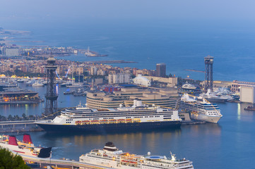 Fototapeta premium passenger cruise ships in Barcelona city, Spain. night scene
