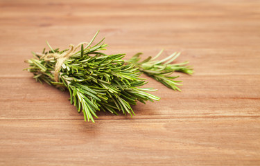 Organic bunch of fresh rosemary on the table