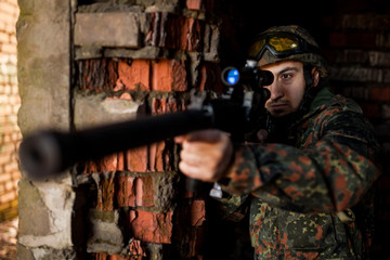 Soldier in the war to aim with weapons