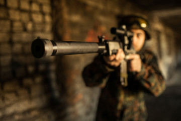 Soldier in the war to aim with weapons