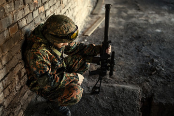 A thoughtful soldier, resting from a military operation