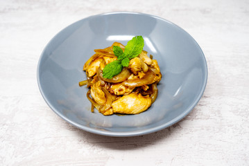 wok fried chicken stir fry with sweet peppers and chinese vegetables