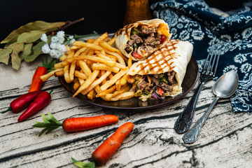 beef tacos served with golden French fries