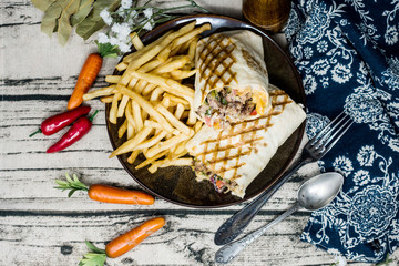 beef tacos served with golden French fries
