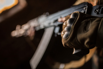 The Arab soldier with the AK-47 Kalashnikov assault rifle
