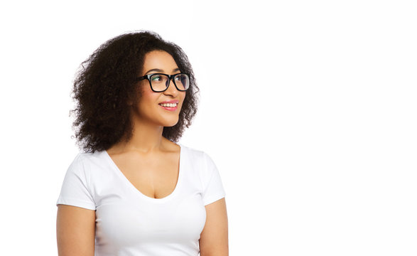 vision, body positive and people concept - happy african american woman in white t-shirt and glasses