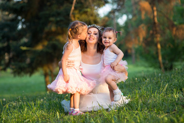 Fototapeta premium woman and children in nature