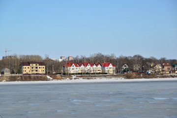view of houses on shore Volga River in Yaroslavl, Russia