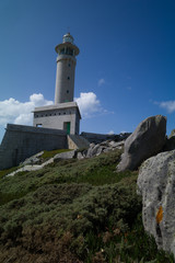 Fototapeta na wymiar Death Coast with lighthouse in Galicia