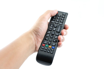 Hand pressing power button on TV remote control