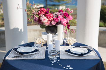 Fototapeta na wymiar Table setting at a luxury wedding or another catered event. Marine themes