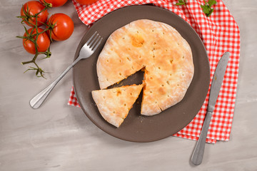 Pizza calzone on wooden background