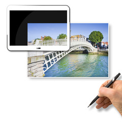 The most famous bridge in Dublin called -Half penny bridge- due to the toll charged for the passage - Concept image with 3D render of a digital tablet and hand writing on blank space