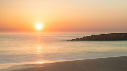Landscape of Furadouro beach, Portugal at sunset.