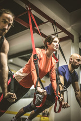 Close up image of friends exercise.