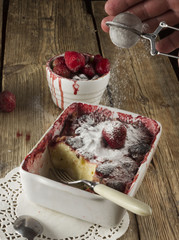 Cheesecake, garnished with berries, mint and peach