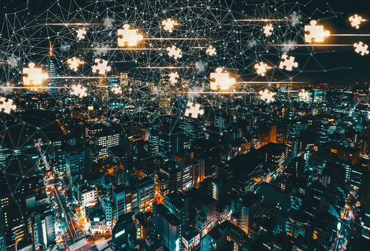 Puzzle Pieces with aerial view of Tokyo, Japan at night