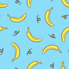 Yellow cartoon bananas on blue background seamless pattern, vector illustration