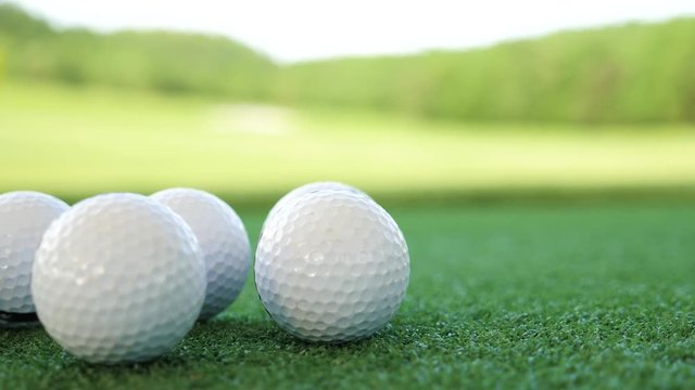 golf balls on artificial grass