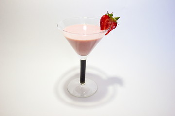 Milk-strawberry cocktail with a strawberry slice