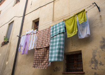 Home laundry with colourful clothing drying