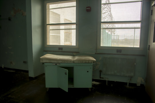 Treatment table in prison hospital treatment room