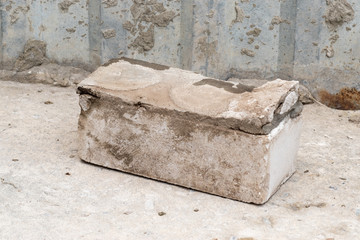 One silicate white brick with cement slurry residues