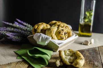 Dough dainted by the woman on the board