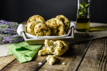 Dough dainted by the woman on the board