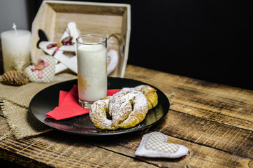 Dough dainted by the woman on the board