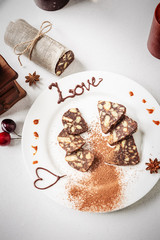 Homemade sweet chocolate sausage cut into pieces