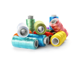 Color sewing threads on white background