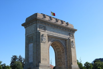 Fototapeta na wymiar Arc of Triumph in Bucharest, Romania 