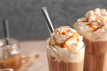 Glass with delicious caramel frappe, closeup