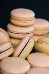 Many colored sweet macaroons cookie. Can be used as a background. Selective focus