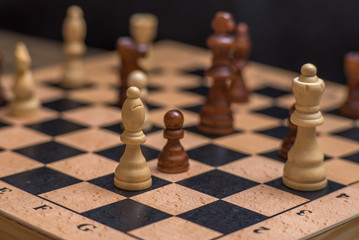 Chess on chessboard close up