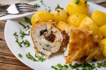 Chicken breast stuffed with cheese and dried tomatoes.