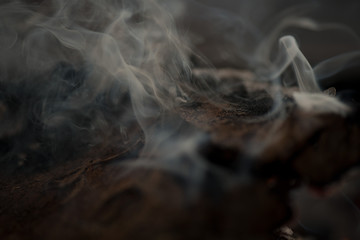 burning and smoking coals