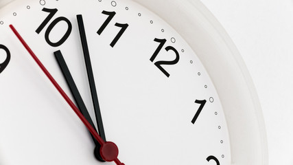 Closeup clock ticking showing ten hours