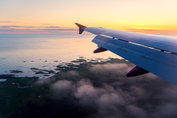 Fototapeta premium View on Iceland through airplane window. Landscape photography