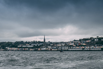 Fototapeta na wymiar The town of Cobh , which sits on an island in Cork city’s harbour, as seen from the sea. It’s known as the Titanic’s last port of call in 1912.